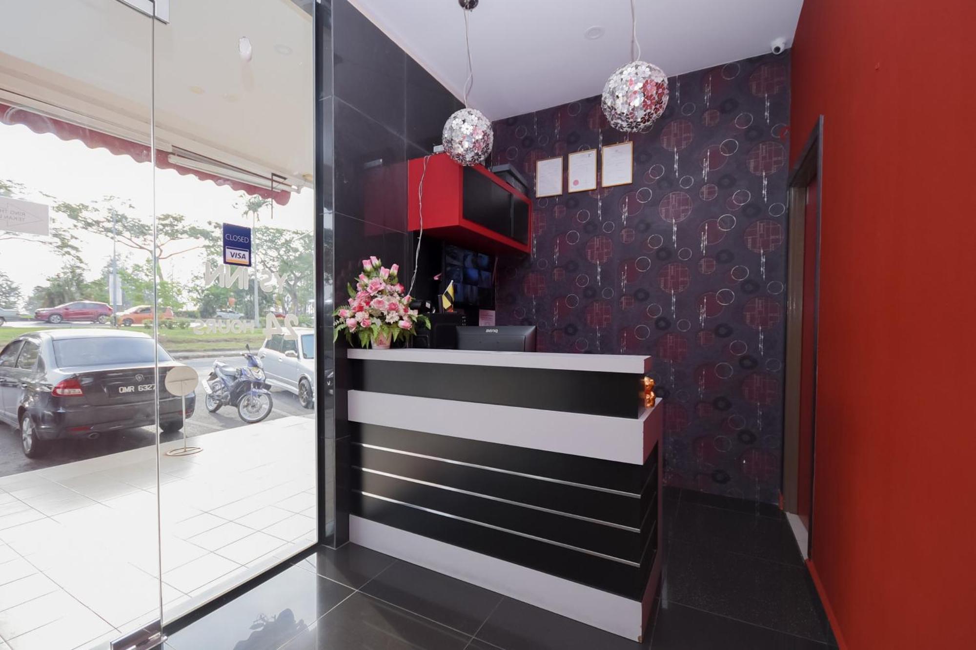 Oyo 89301 Ys Inn Miri Exterior foto